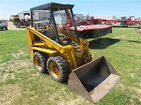 owatonna 320 skid steer|440 mustang skid steer specifications.